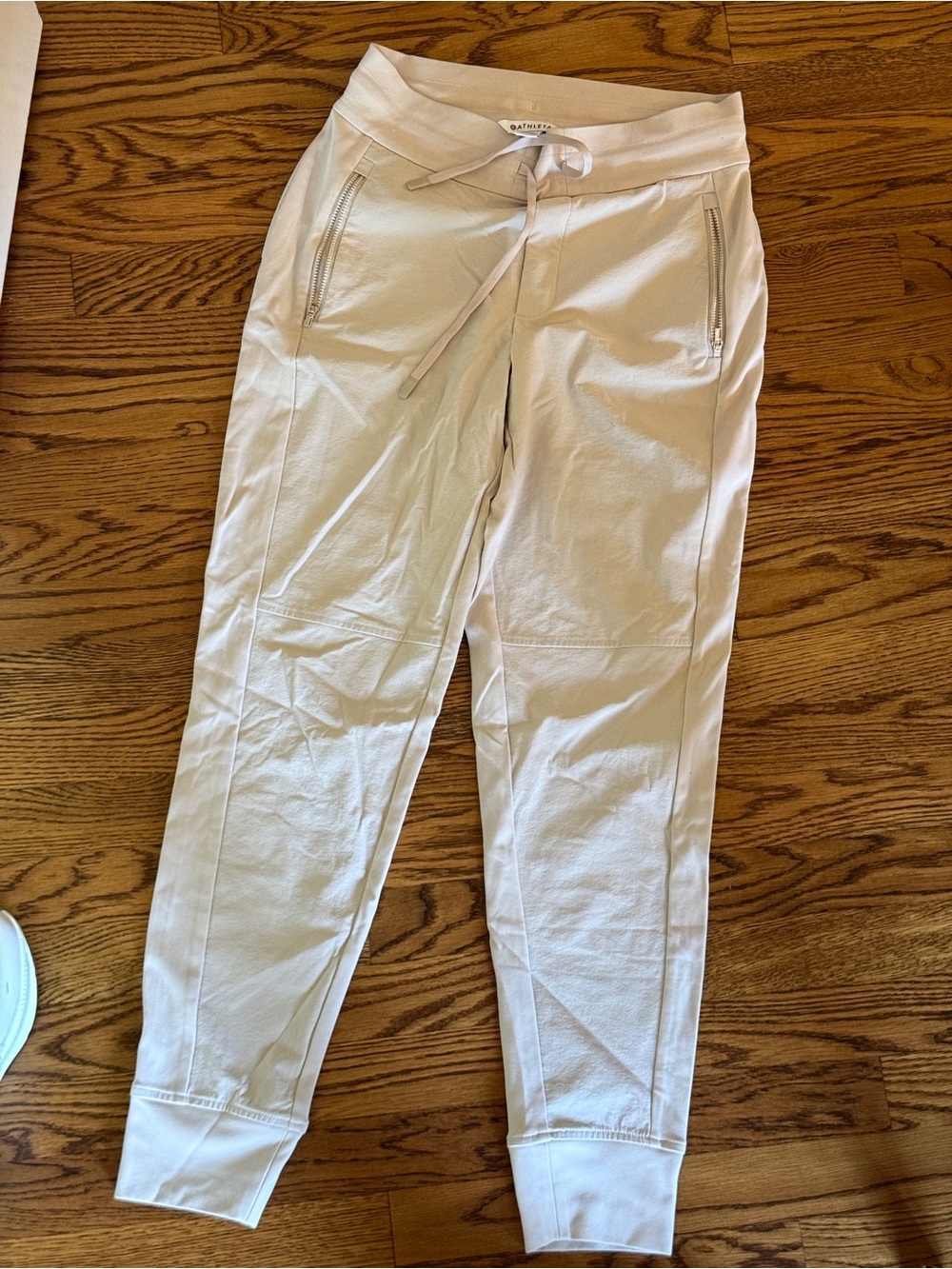 Athleta Light Cream Drawstring Joggers with Zip Pockets